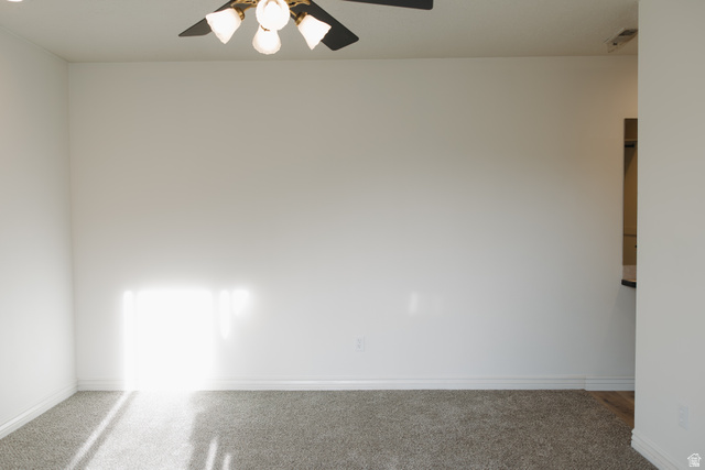 215 South 1050th West, Unit 10 Provo, UT 84601 - Photo 21 of 38 Unfurnished room featuring ceiling fan and carpet flooring