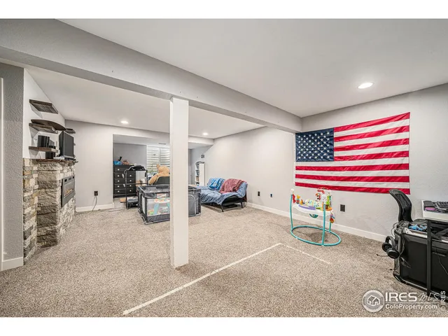 a room with furniture and a gym equipment