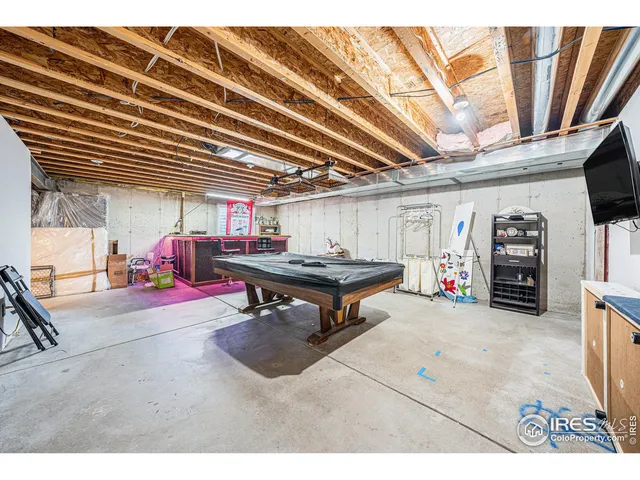 a room with lots of furniture and clutter