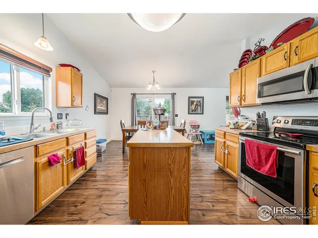 a very nice looking living room with a large window