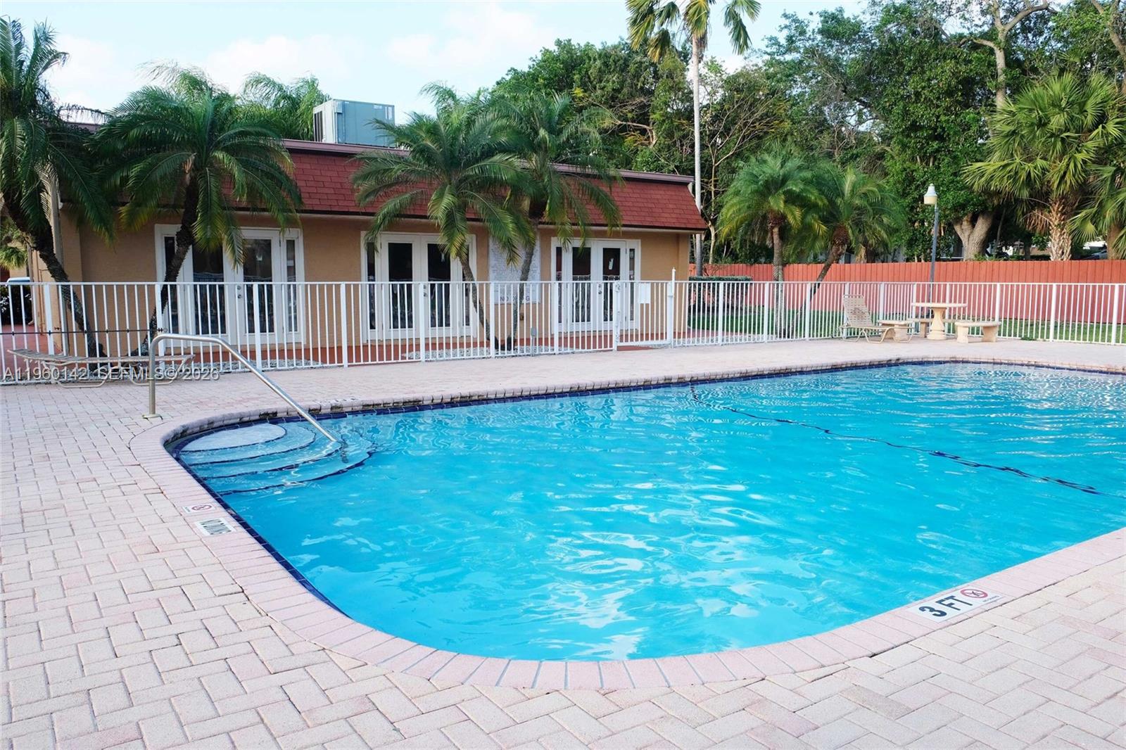 9970 Southwest 88th Street, Unit 9149 Miami, FL 33176 - Photo 27 of 32 Two refurbished pools, Clubhouse