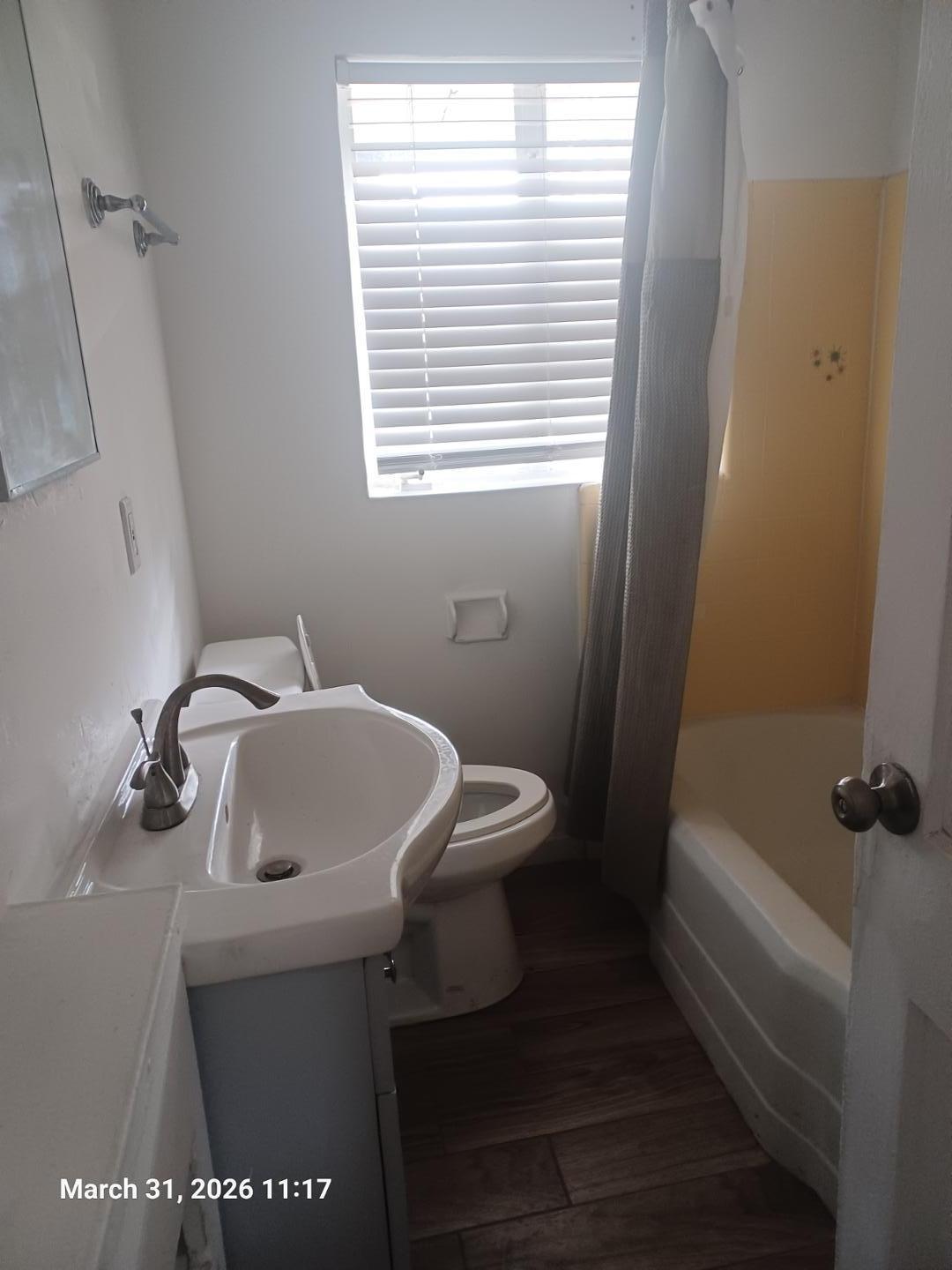 6746 North 14th Street Phoenix, AZ 85014 - Photo 7 of 9 a bathroom with a sink a toilet and shower