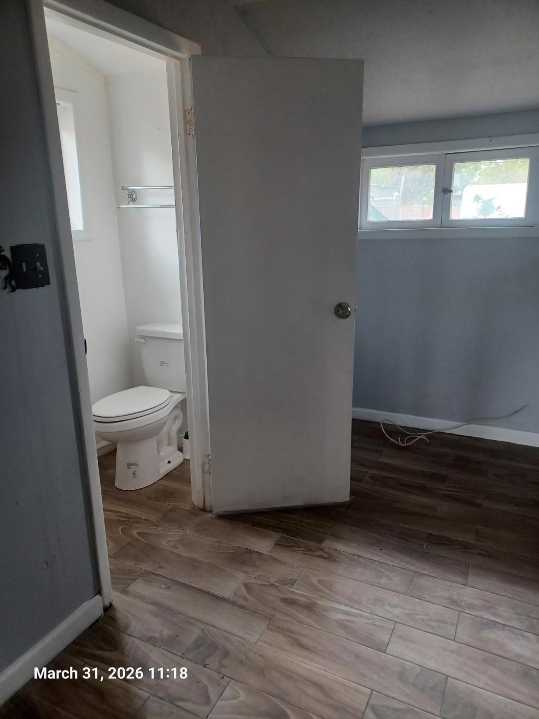 6746 North 14th Street Phoenix, AZ 85014 - Photo 8 of 9 a bathroom with a toilet and a shower