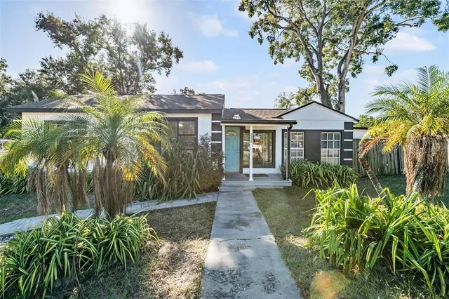 a view of a house with a garden