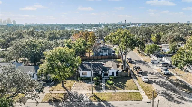 a view of city with ocean