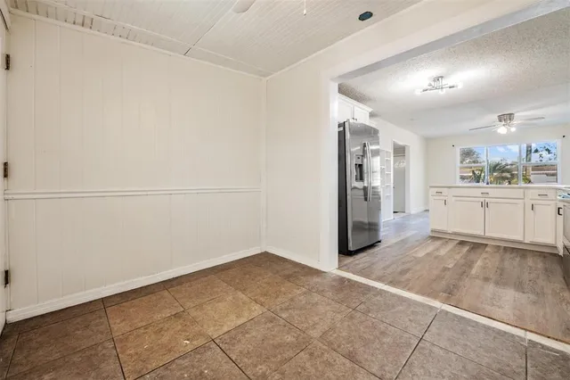 a view of a kitchen with an empty space