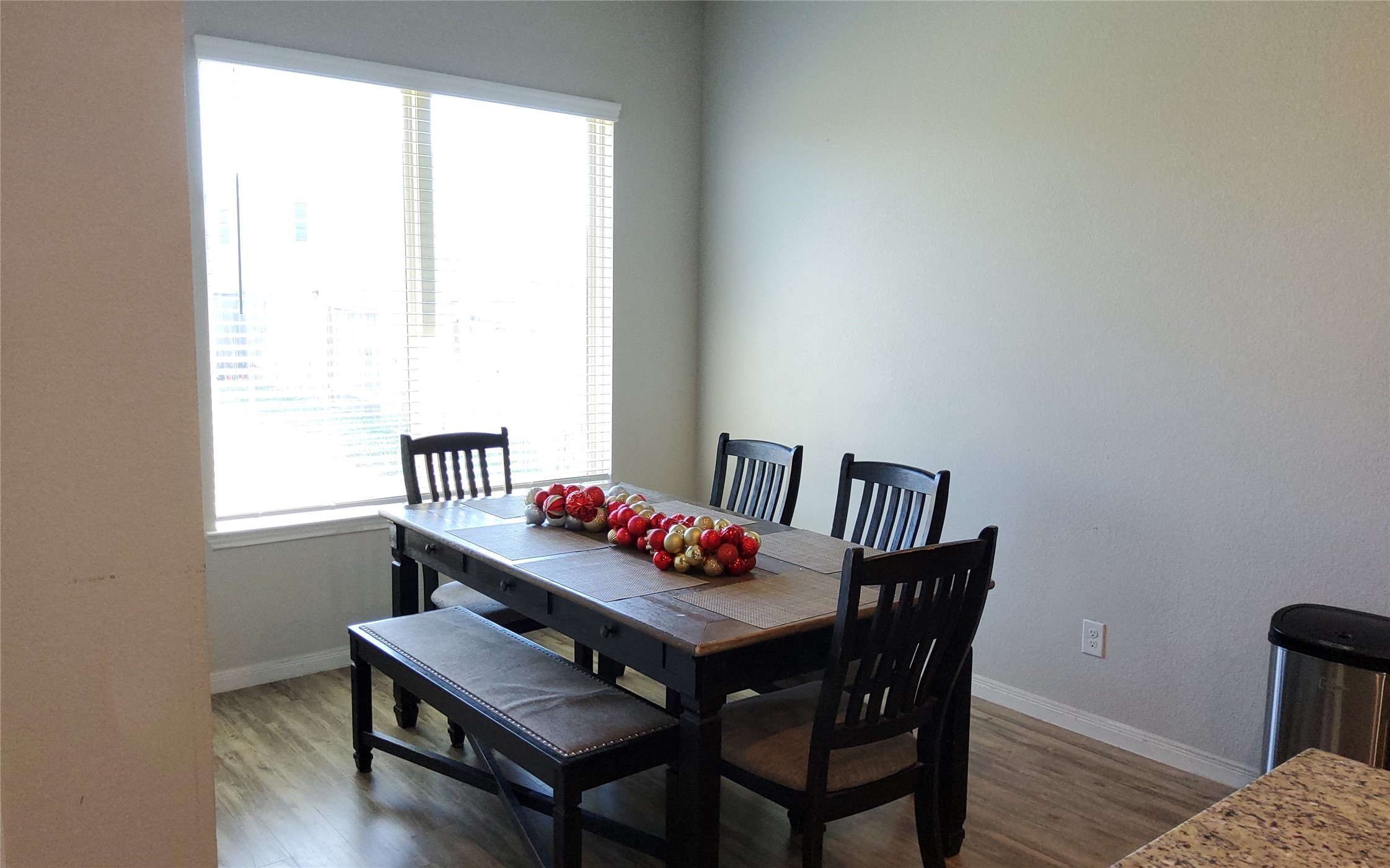 24418 Hollow Gate Meadow Court Spring, TX 77389 - Photo 23 of 45 a view of a dining room with furniture and wooden floor