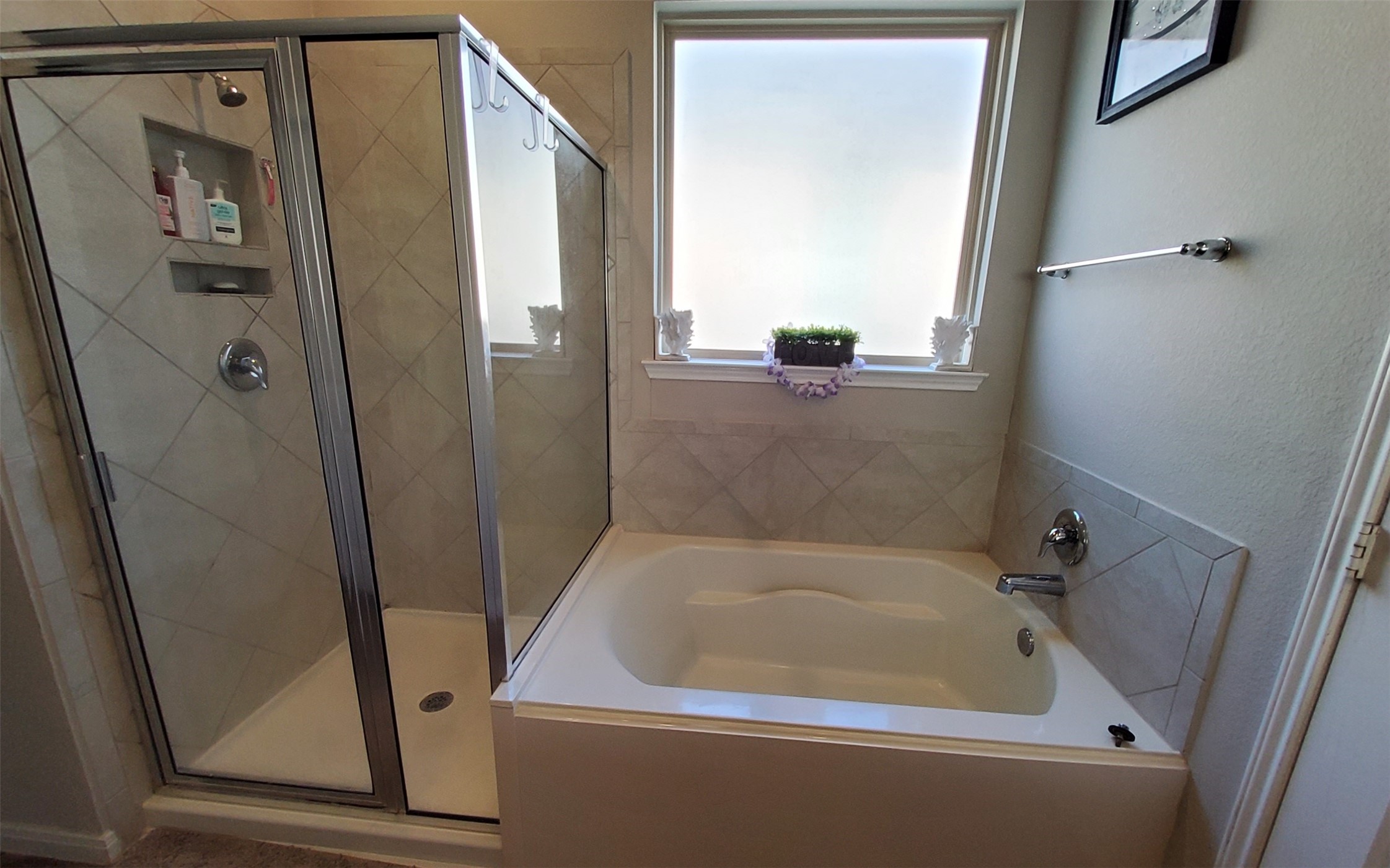 24418 Hollow Gate Meadow Court Spring, TX 77389 - Photo 25 of 45 a bathroom with a bathtub