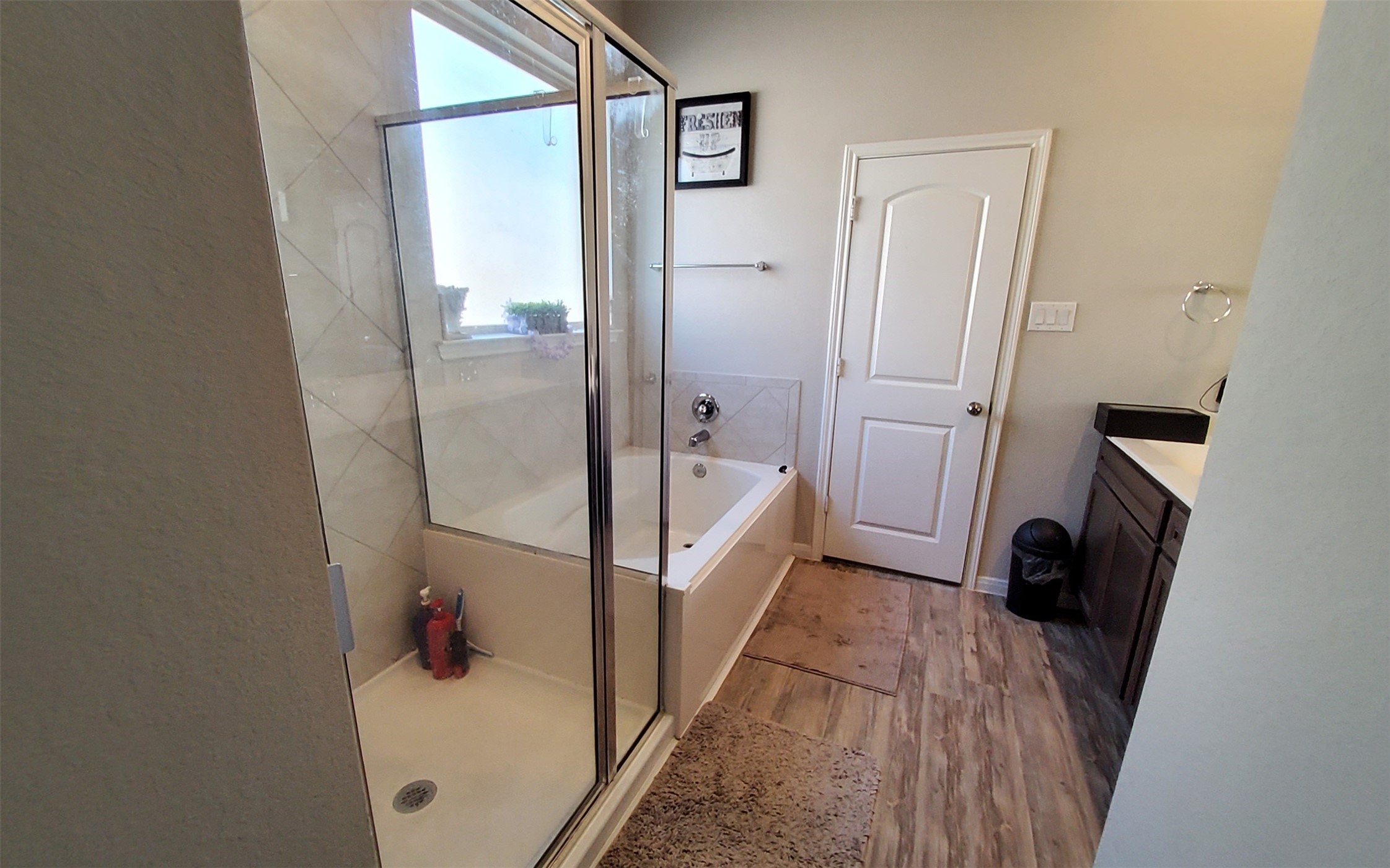 24418 Hollow Gate Meadow Court Spring, TX 77389 - Photo 26 of 45 a bathroom with a bathtub and a shower