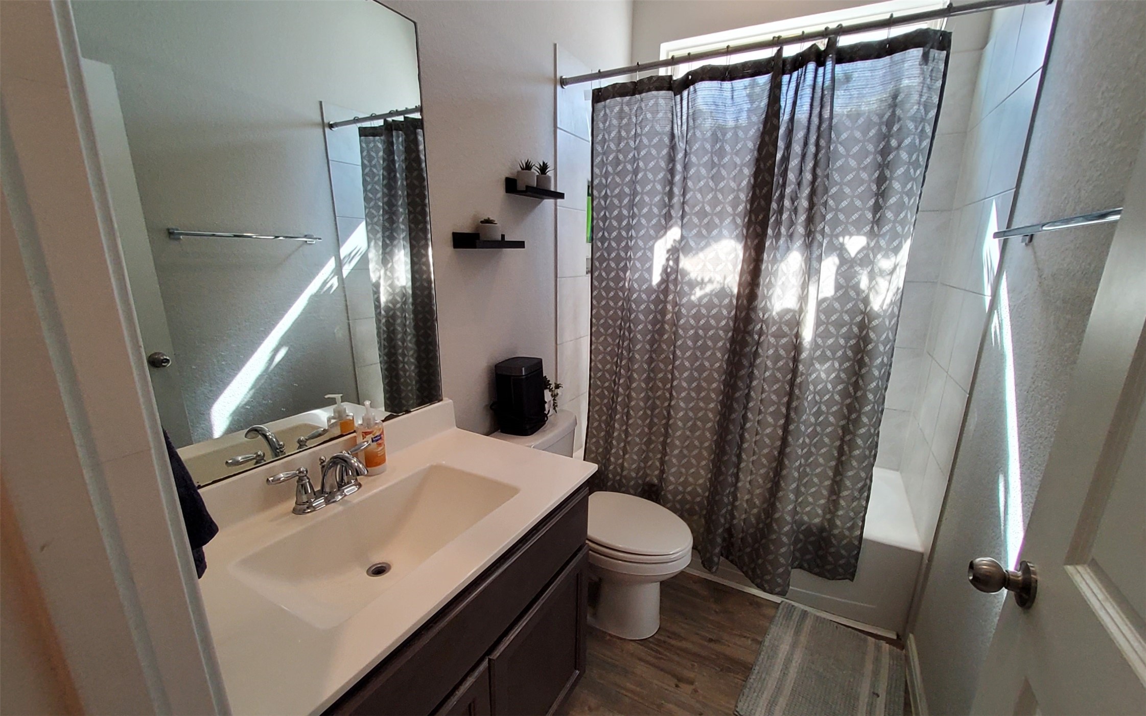 24418 Hollow Gate Meadow Court Spring, TX 77389 - Photo 31 of 45 a bathroom with a sink toilet and shower