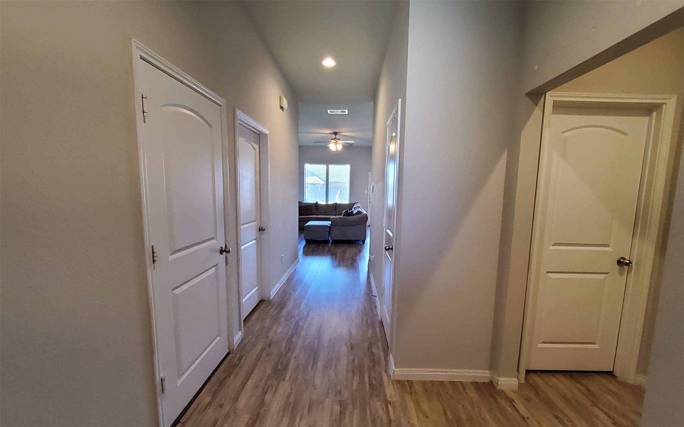24418 Hollow Gate Meadow Court Spring, TX 77389 - Photo 8 of 45 a view of a hallway and wooden floor