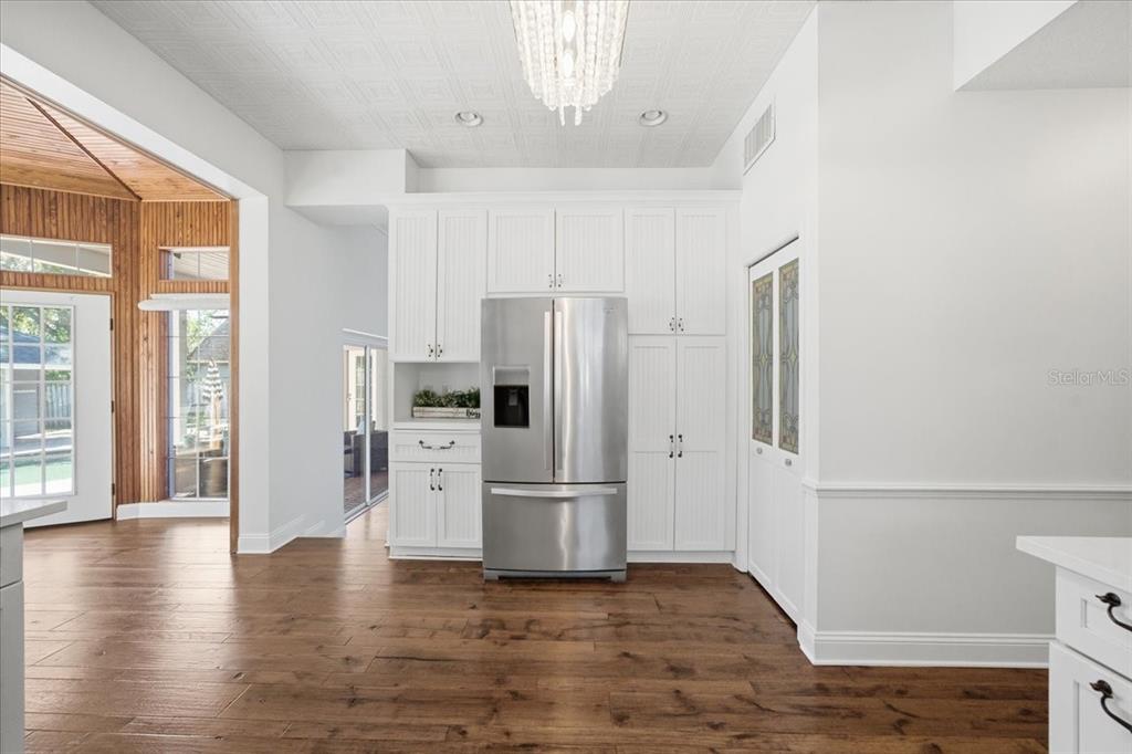 3049 Geiger Court Clearwater, FL 33761 - Photo 30 of 90 a kitchen with stainless steel appliances a refrigerator and a stove top oven