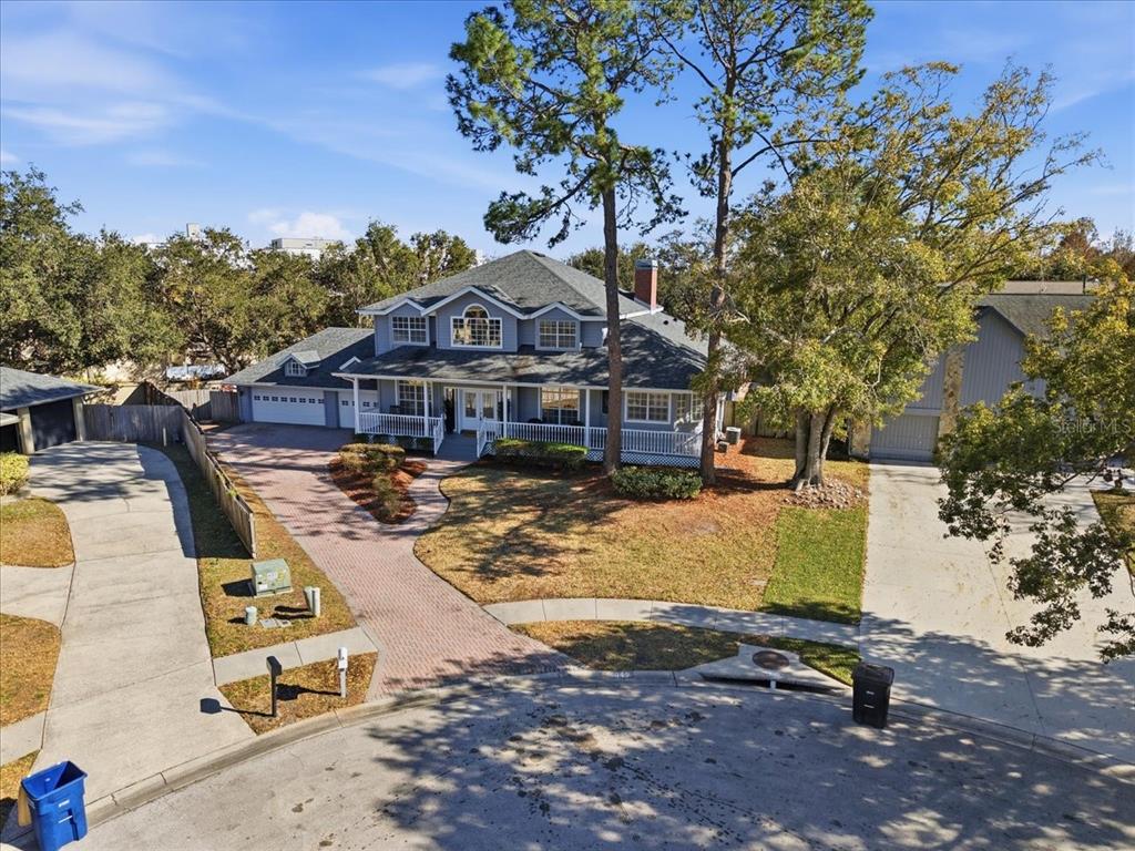 3049 Geiger Court Clearwater, FL 33761 - Photo 4 of 90 a view of a swimming pool with lounge chair