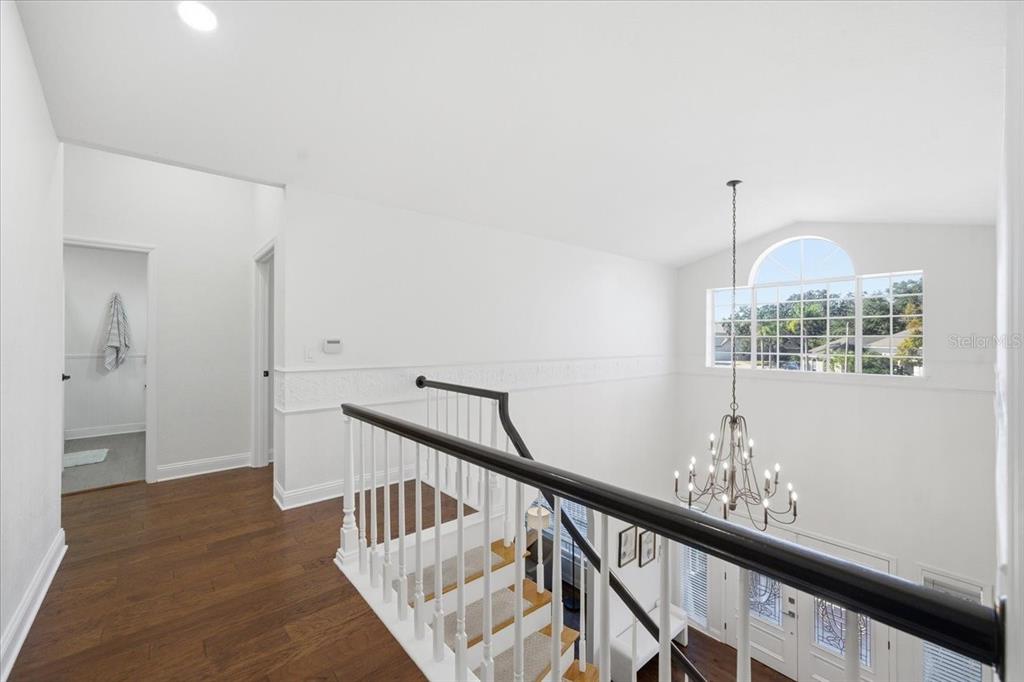 3049 Geiger Court Clearwater, FL 33761 - Photo 53 of 90 a view of an entryway with wooden floor