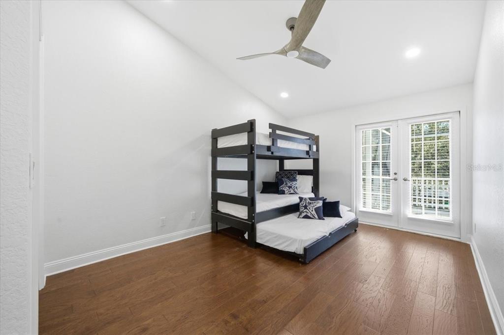 3049 Geiger Court Clearwater, FL 33761 - Photo 63 of 90 a living room with hard wood floors and a window