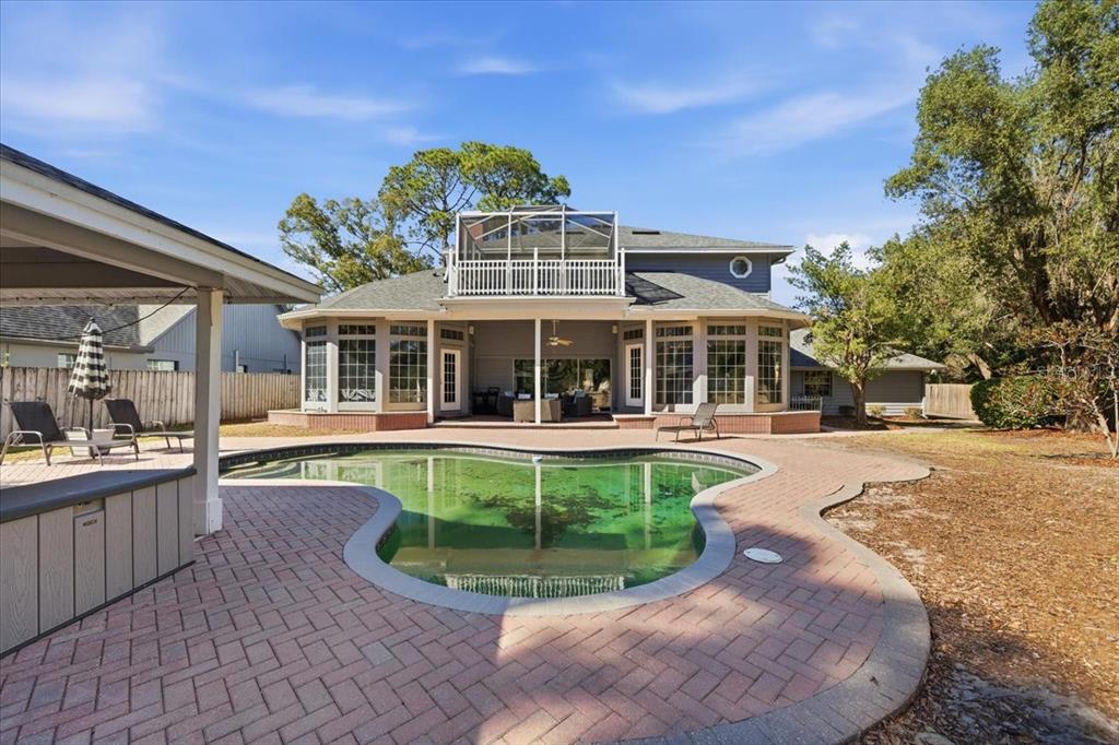 3049 Geiger Court Clearwater, FL 33761 - Photo 77 of 90 a view of a house with a swimming pool