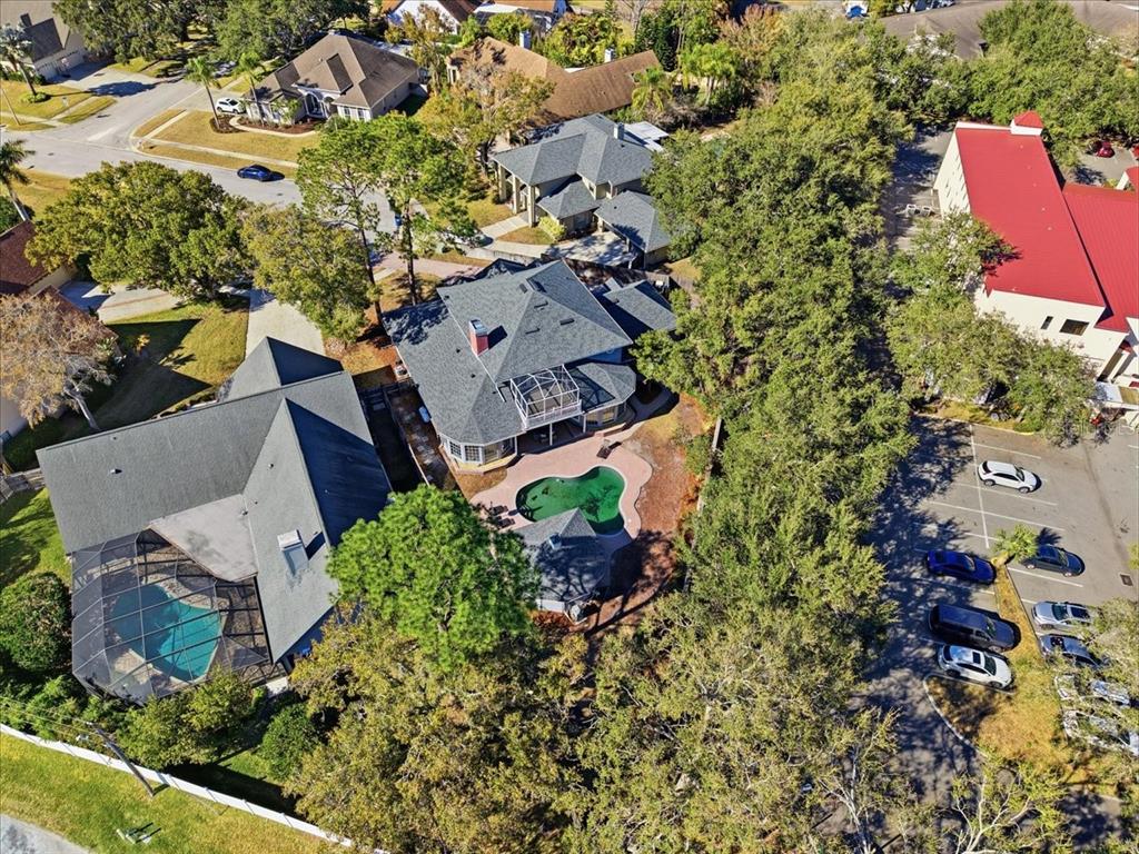 3049 Geiger Court Clearwater, FL 33761 - Photo 86 of 90 an aerial view of multiple houses with yard