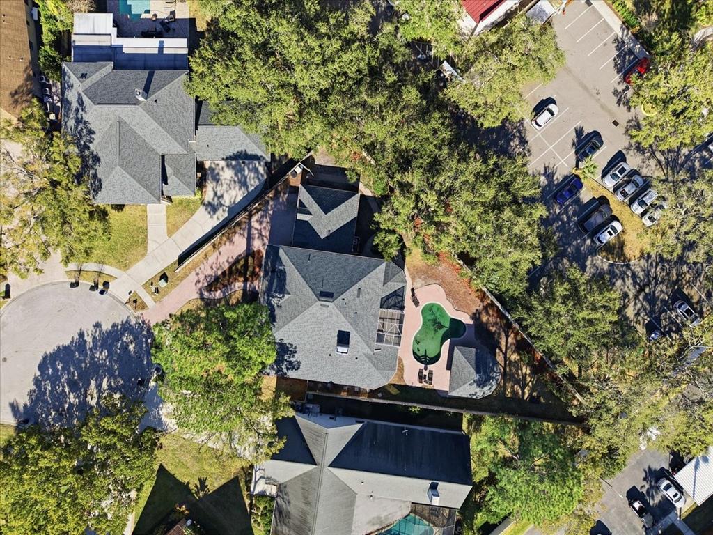 3049 Geiger Court Clearwater, FL 33761 - Photo 90 of 90 an aerial view of a house with a yard