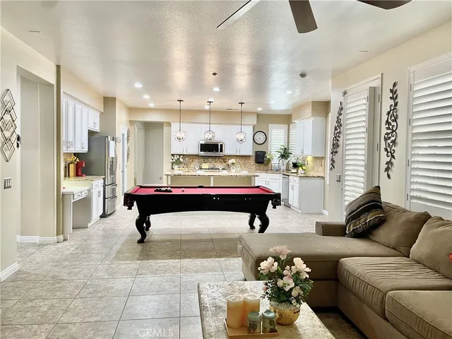 a view of a kitchen from the hallway