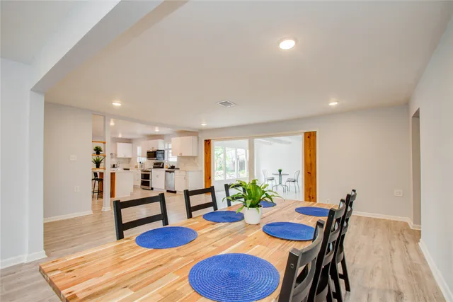 a view of a dining room with furniture