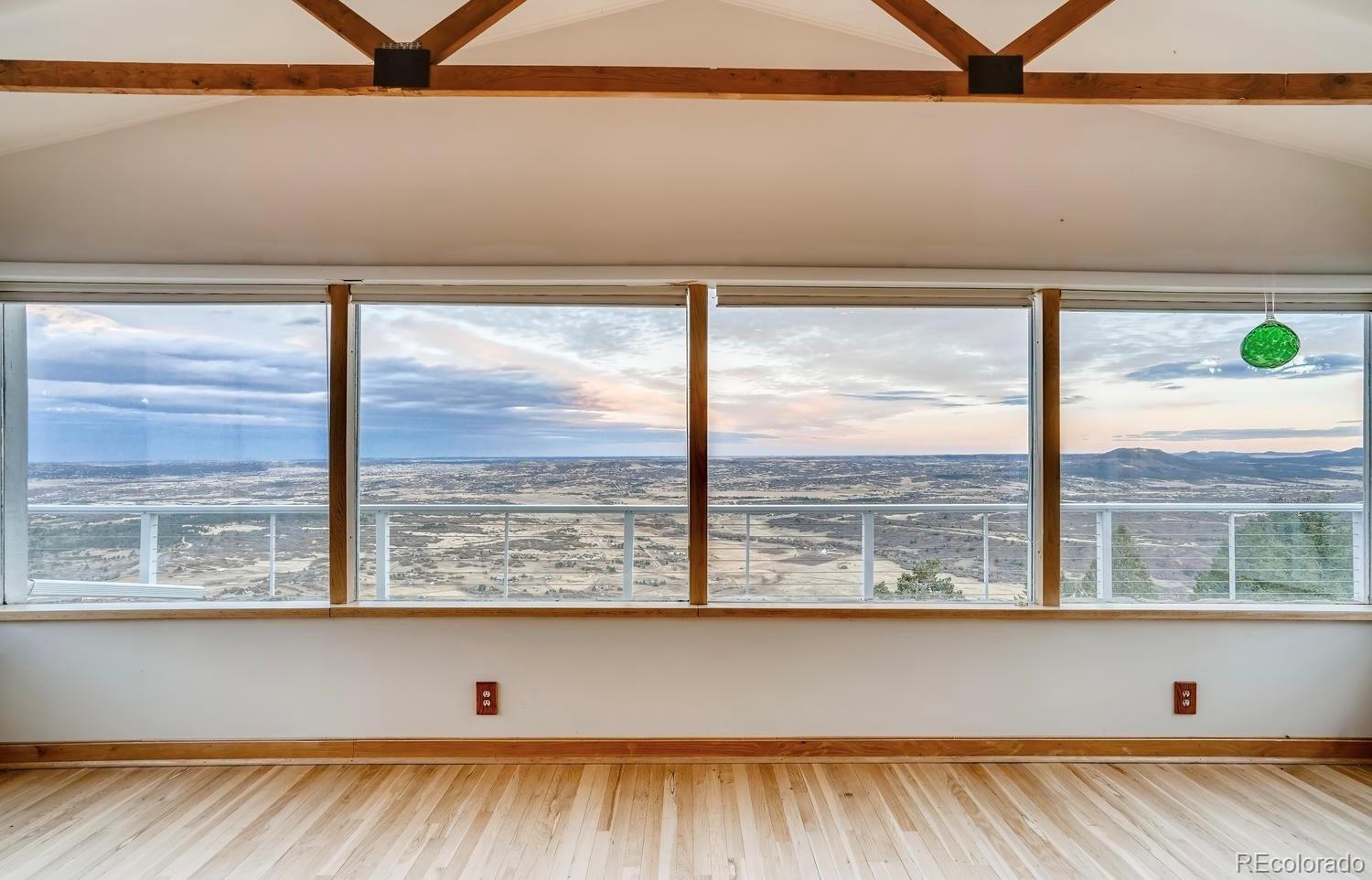1150 North Madge Gulch Road Sedalia, CO 80135 - Photo 16 of 49 a view of sky from window
