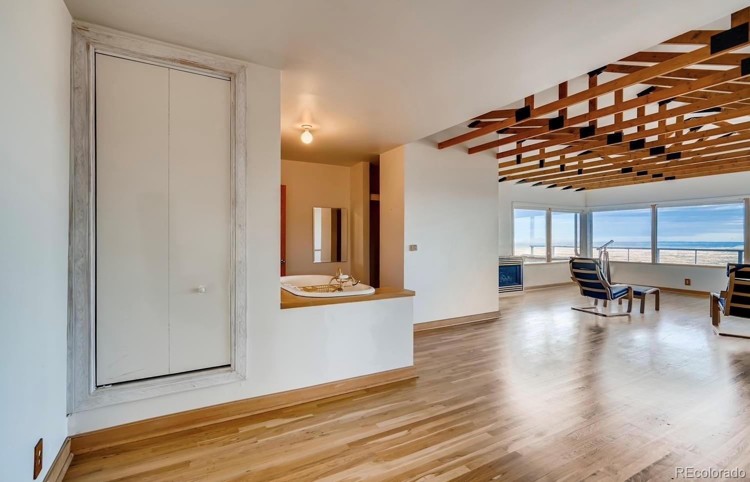 1150 North Madge Gulch Road Sedalia, CO 80135 - Photo 17 of 49 a view of kitchen with furniture and window