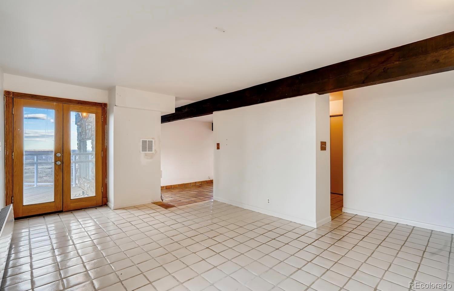 1150 North Madge Gulch Road Sedalia, CO 80135 - Photo 31 of 49 a view of an empty room