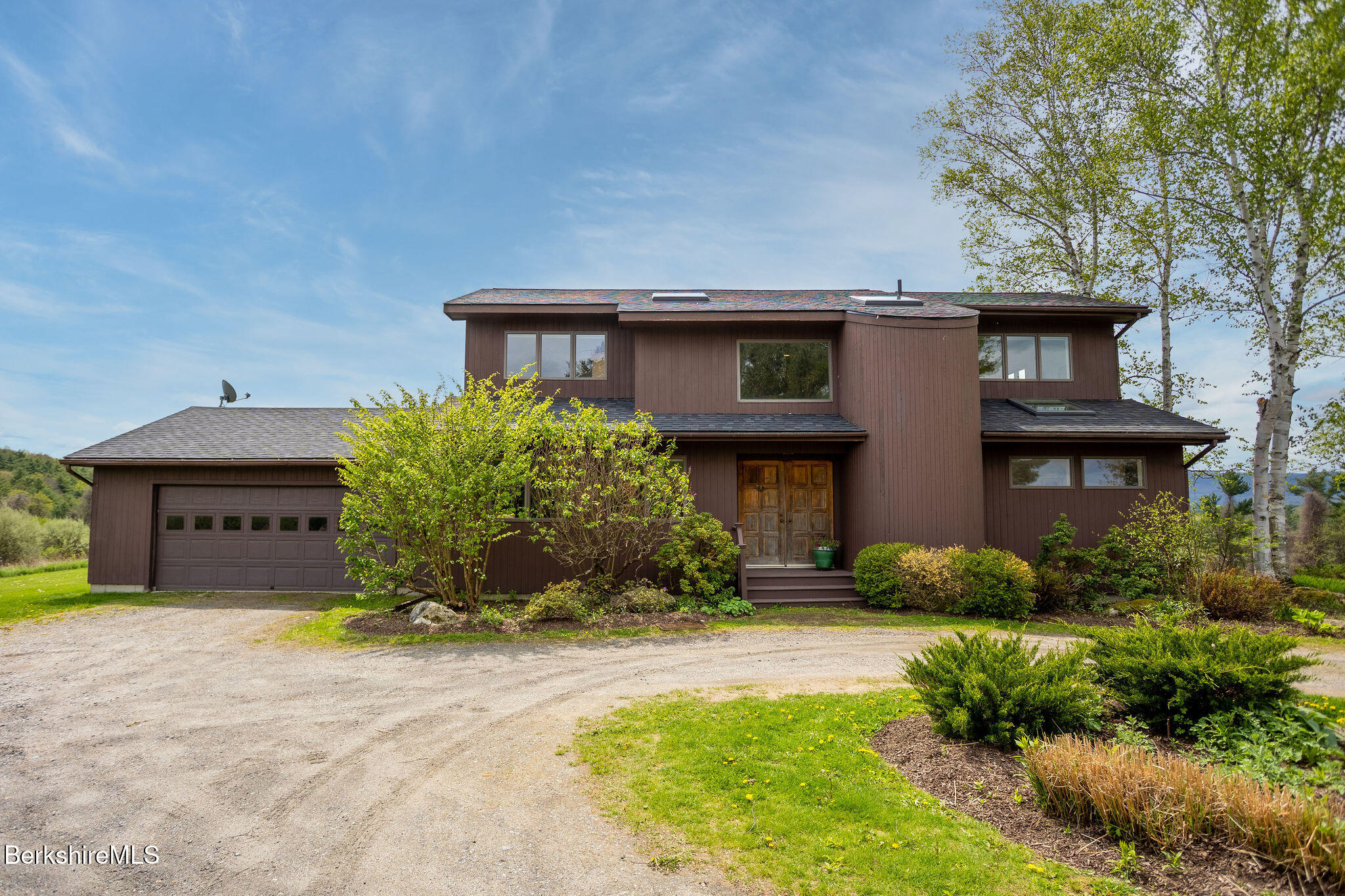 77 Hurlburt Road Great Barrington, MA 01230 - Photo 3 of 48 a house view with a outdoor space
