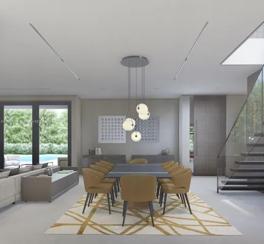 a living room with furniture a lamp and a large window