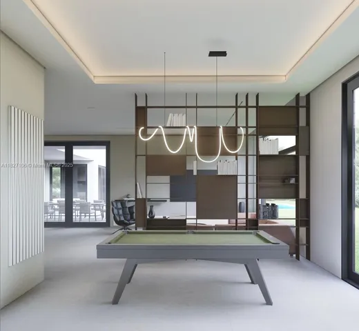 a living room with lots of gym equipment and shower