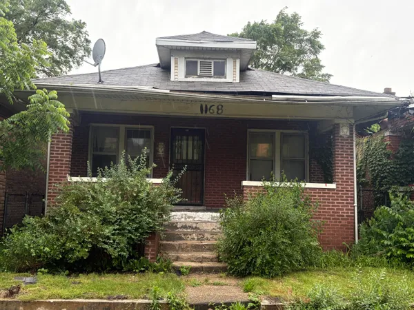 front view of house with a yard