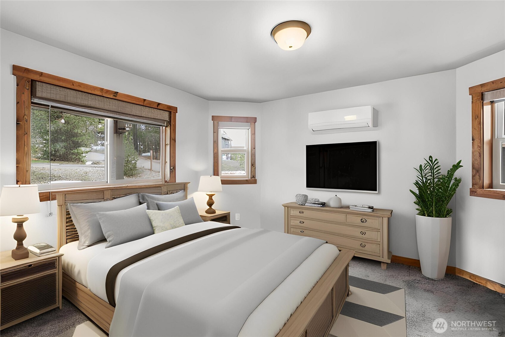 90 Rockberry Loop Ronald, WA 98940 - Photo 11 of 40 a bedroom with a bed and a flat screen tv