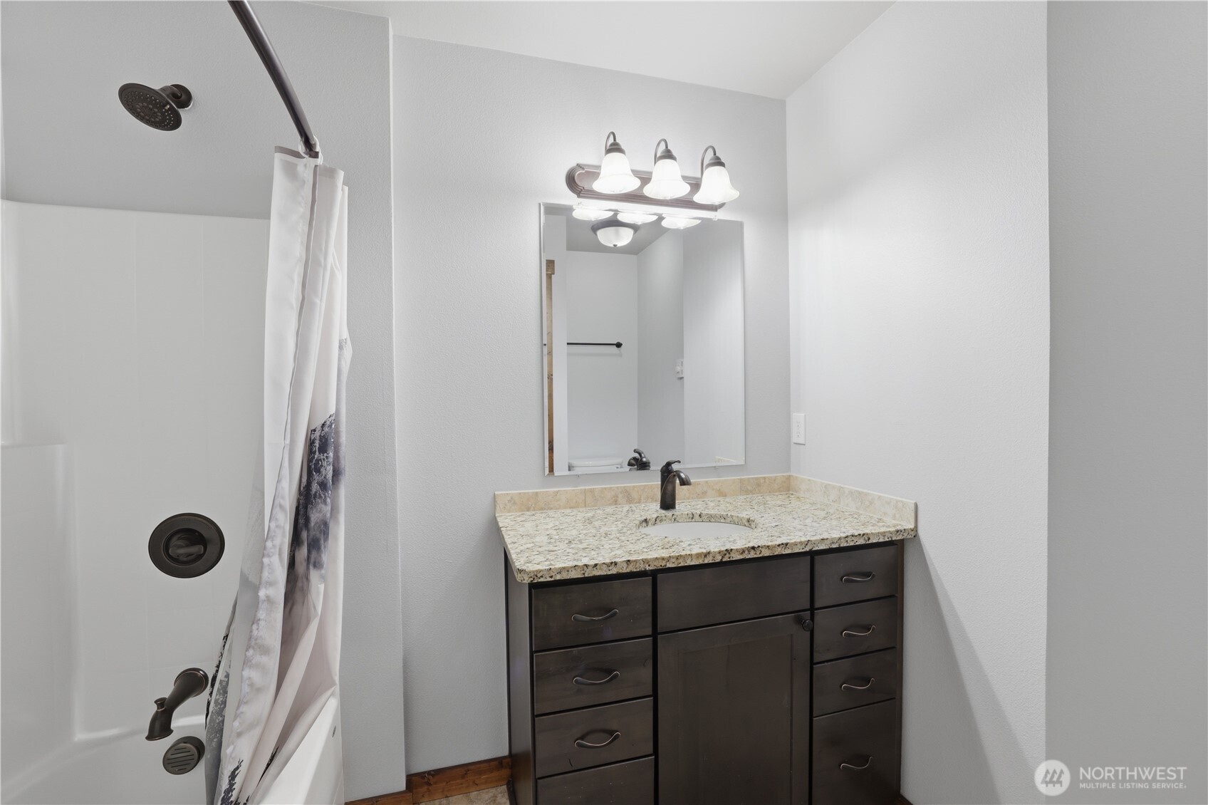 90 Rockberry Loop Ronald, WA 98940 - Photo 12 of 40 a bathroom with a granite countertop sink a mirror and shower