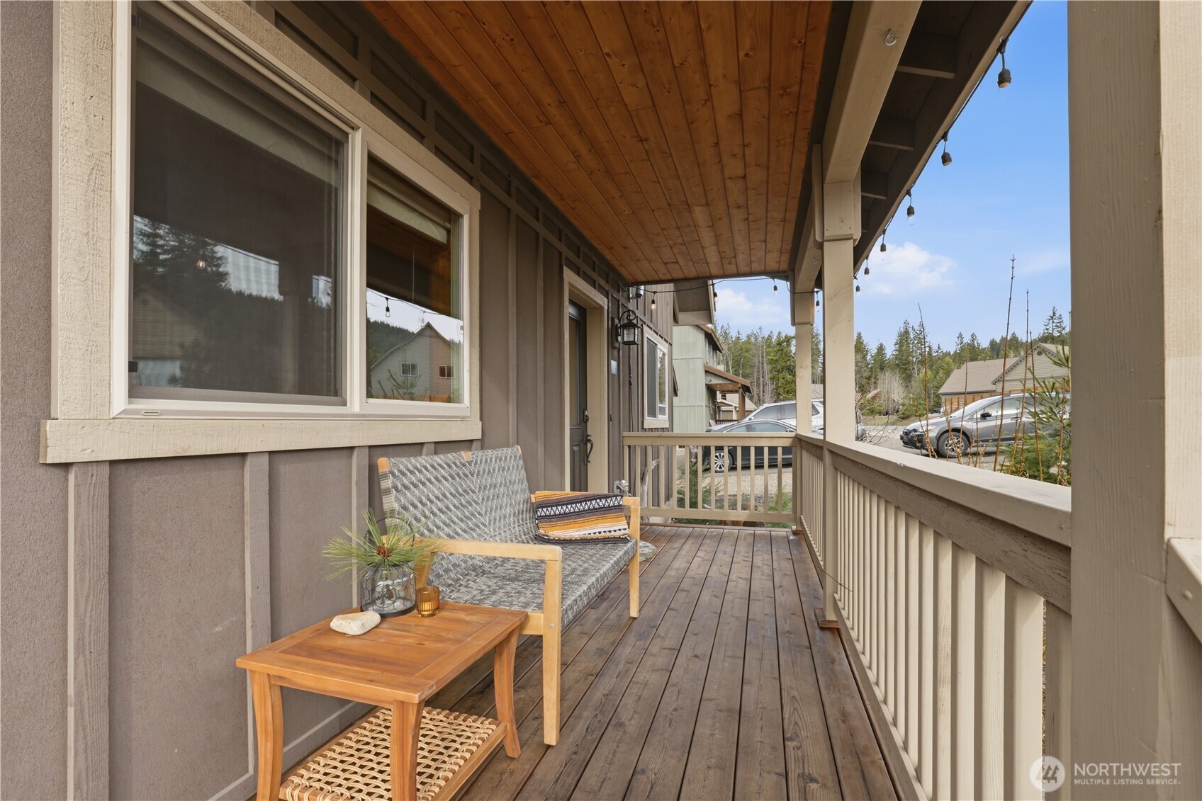 90 Rockberry Loop Ronald, WA 98940 - Photo 4 of 40 a balcony with wooden floor and furniture