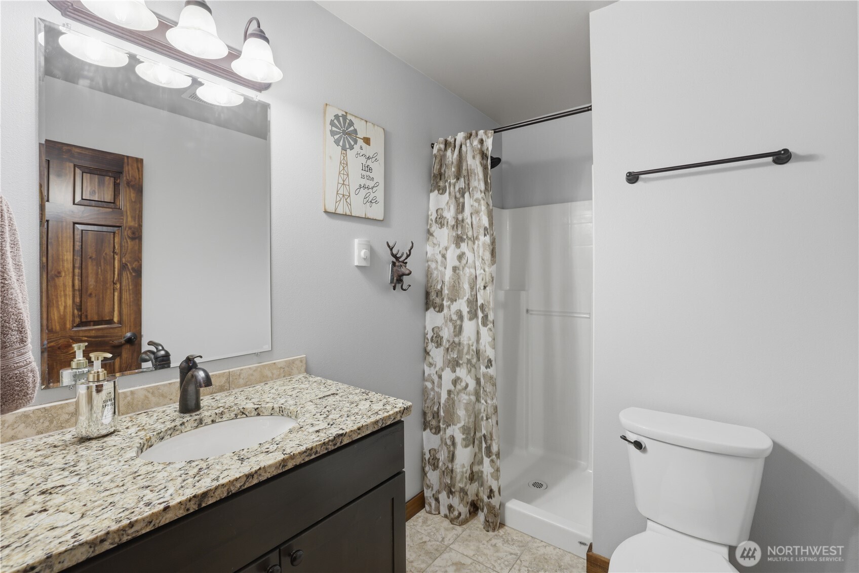 90 Rockberry Loop Ronald, WA 98940 - Photo 10 of 40 a bathroom with a granite countertop sink toilet and shower