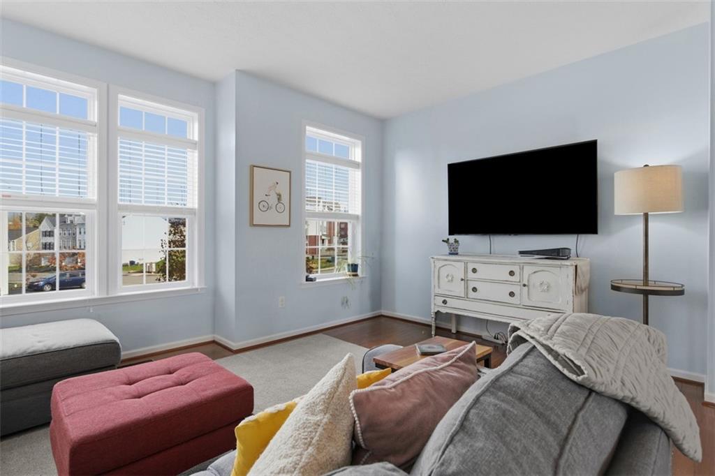 44 Coolidge Drive McKees Rocks, PA 15136 - Photo 11 of 36 a bedroom with bed or couch and a flat screen tv