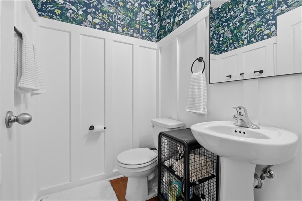 44 Coolidge Drive McKees Rocks, PA 15136 - Photo 17 of 36 a bathroom with a sink a toilet and shower