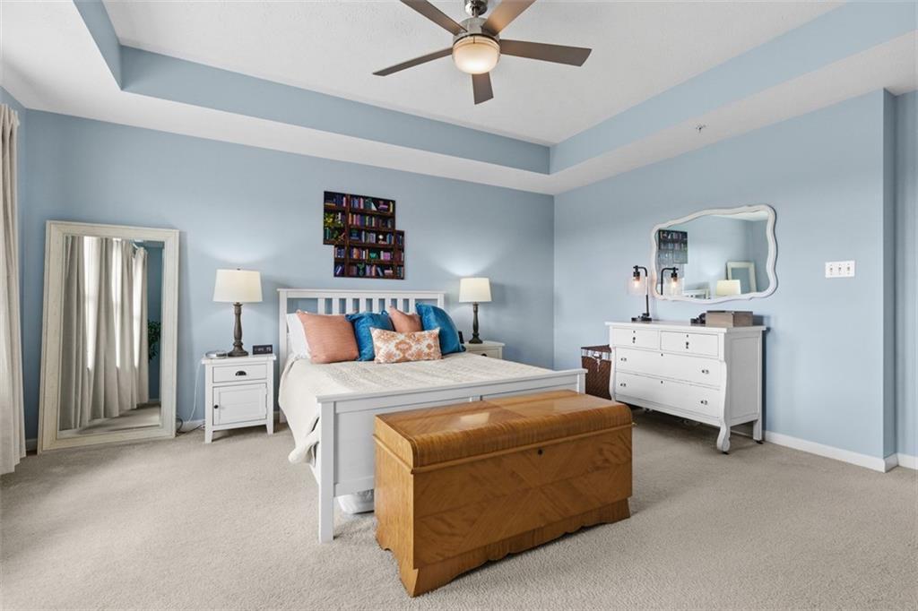 44 Coolidge Drive McKees Rocks, PA 15136 - Photo 18 of 36 a bed room with a bed and a chandelier