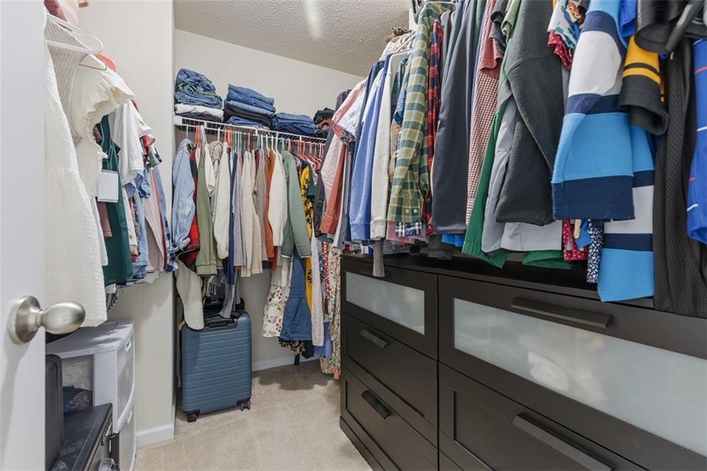 44 Coolidge Drive McKees Rocks, PA 15136 - Photo 22 of 36 a view of walk in closet with clothes and shoes