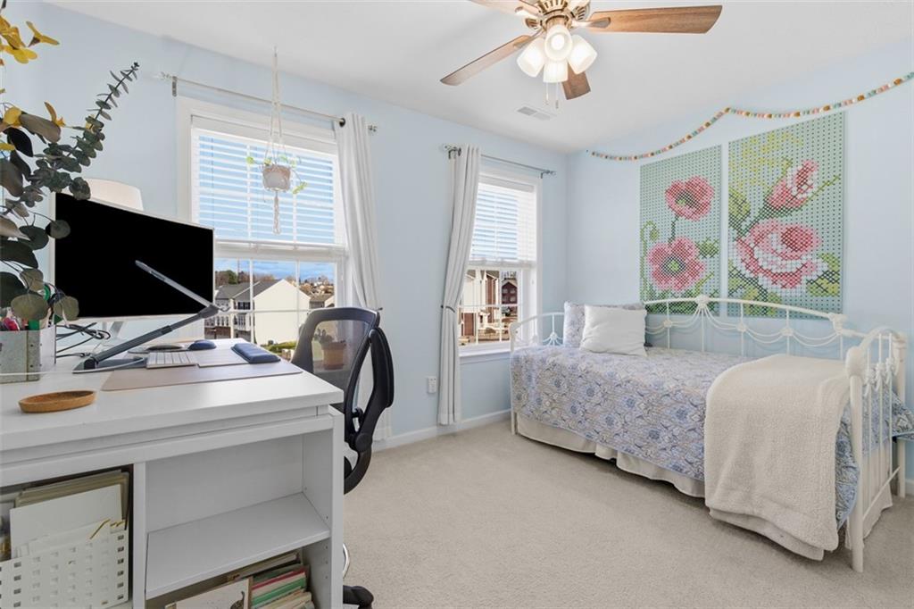 44 Coolidge Drive McKees Rocks, PA 15136 - Photo 26 of 36 a bedroom with a bed and a desk