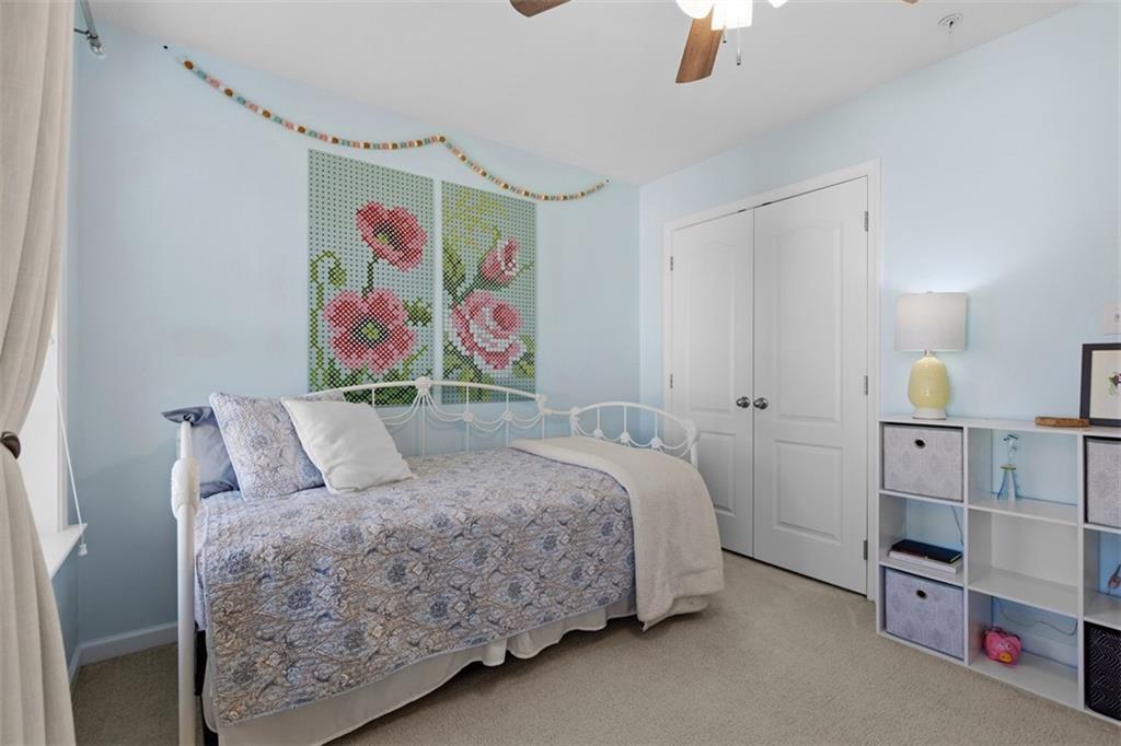 44 Coolidge Drive McKees Rocks, PA 15136 - Photo 27 of 36 a bed room with a bed and painting on the wall