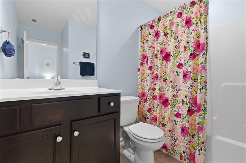 44 Coolidge Drive McKees Rocks, PA 15136 - Photo 29 of 36 a bathroom with a sink toilet and shower