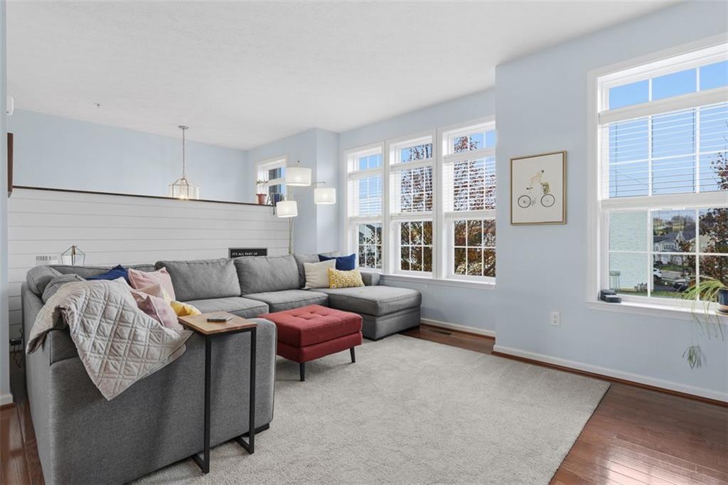44 Coolidge Drive McKees Rocks, PA 15136 - Photo 10 of 36 a living room with furniture and a window