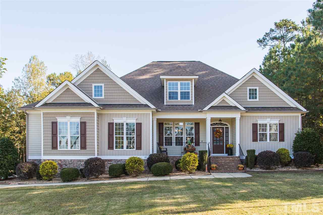 12 Vista Ridge Drive Willow Spring, NC 27592 - Photo 1 of 30 Welcome to this beautiful and well-maintained 3 BR, 2.5 BA home situated on a 0.96 acre lot. Home features new carpet, lots of hardwood flooring on the first floor, heavy trim, and some arched entryways.