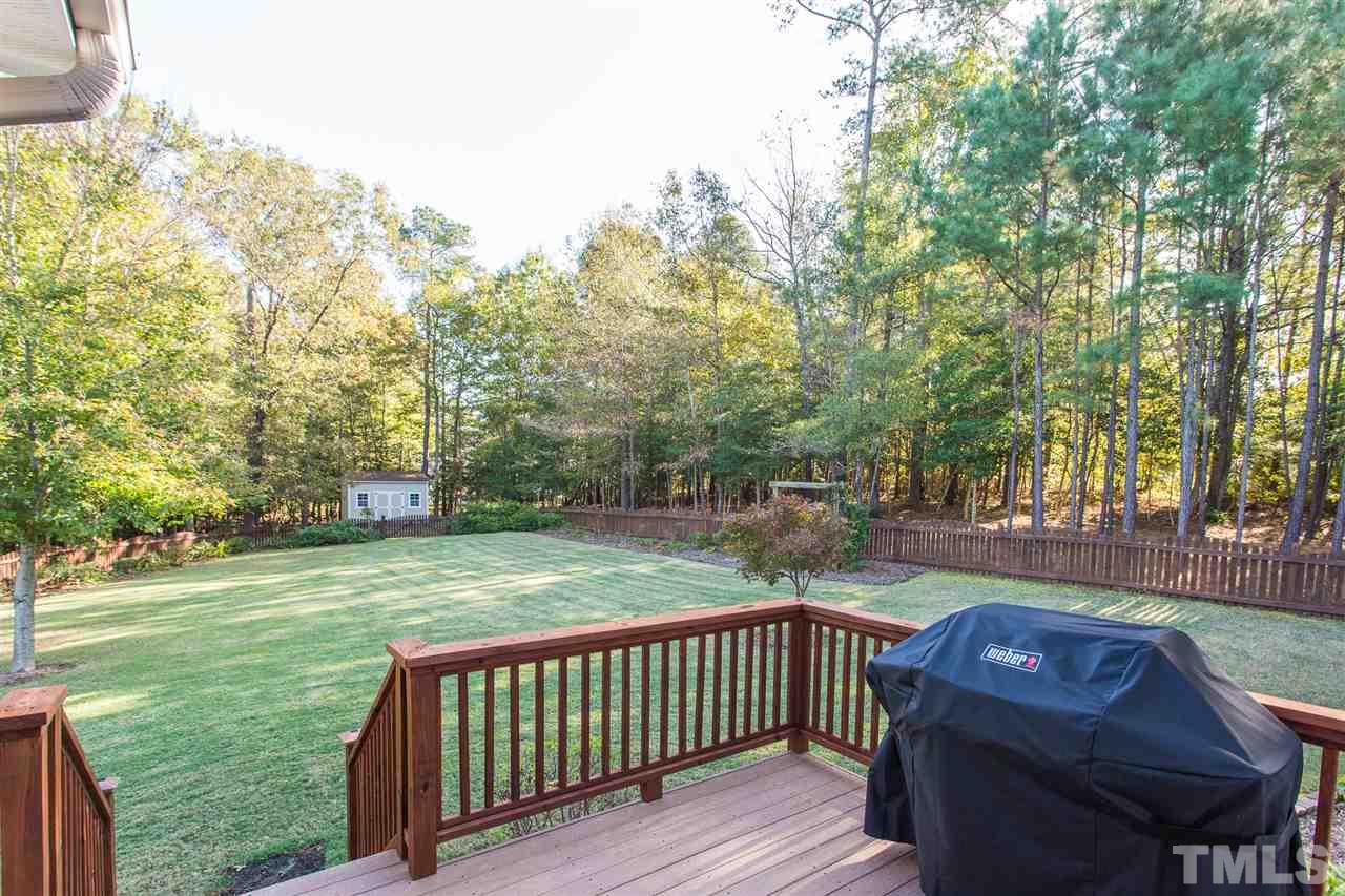 12 Vista Ridge Drive Willow Spring, NC 27592 - Photo 27 of 30 You will enjoy grilling out on those fun, summer afternoons on this spacious deck overlooking your fenced-in back yard.