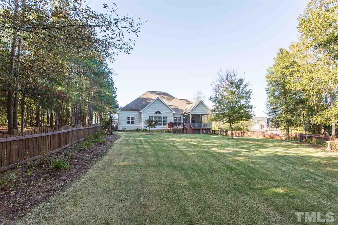 12 Vista Ridge Drive Willow Spring, NC 27592 - Photo 29 of 30 You will enjoy playing and having fun in this spacious back yard which is fenced-in for your enjoyment.