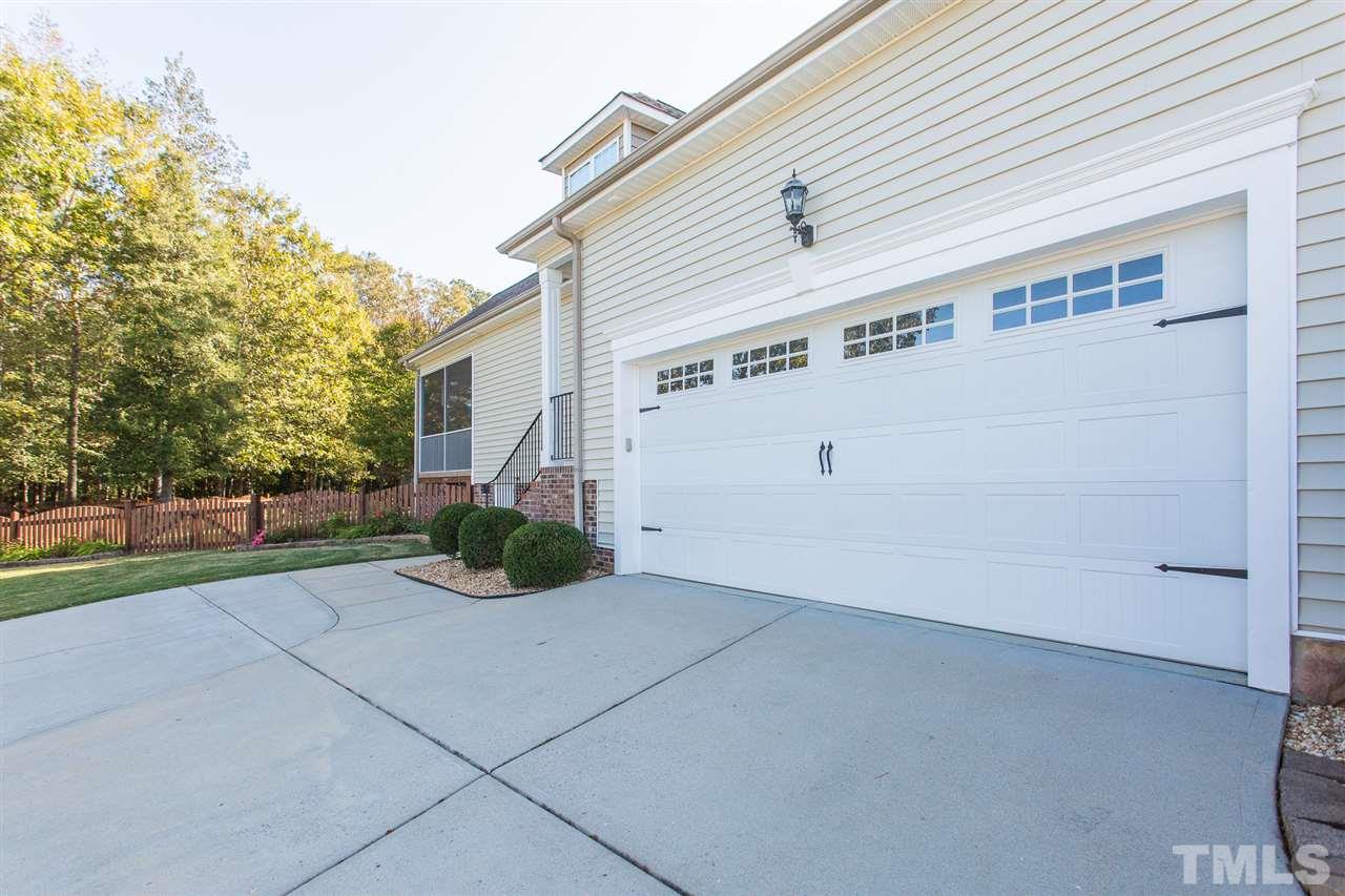 12 Vista Ridge Drive Willow Spring, NC 27592 - Photo 4 of 30 This lovely home features a spacious, side entry, 2-car garage.
