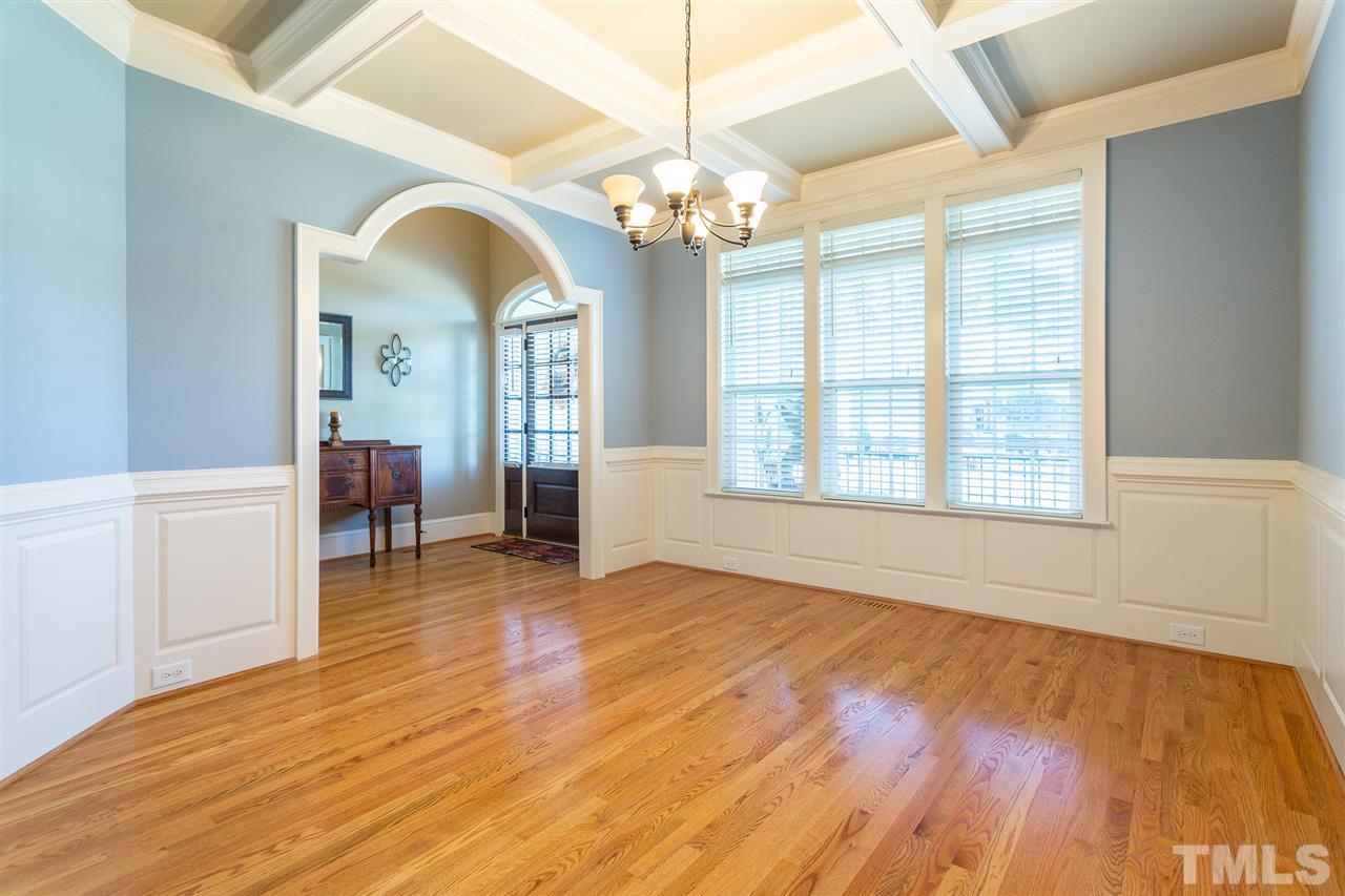 12 Vista Ridge Drive Willow Spring, NC 27592 - Photo 6 of 30 You will enjoy entertaining guests in this exquisite formal dining room. Room boasts a beautiful coffered ceiling, hardwood floors, wainscoting, chair railing, and heavy trim.