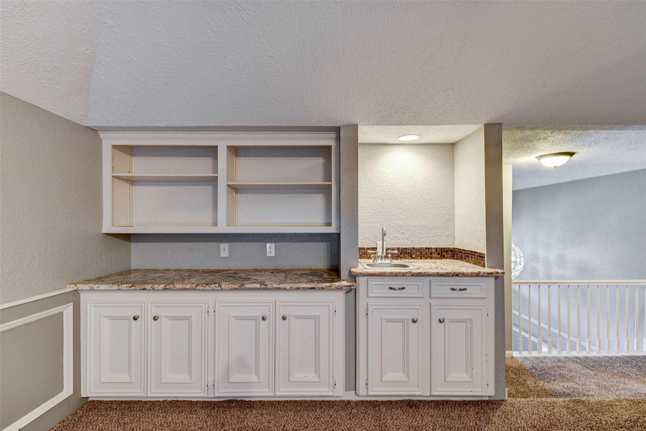 18310 Lake Oaks Drive Spring, TX 77388 - Photo 20 of 31 a view of cabinets with granite countertop cabinets