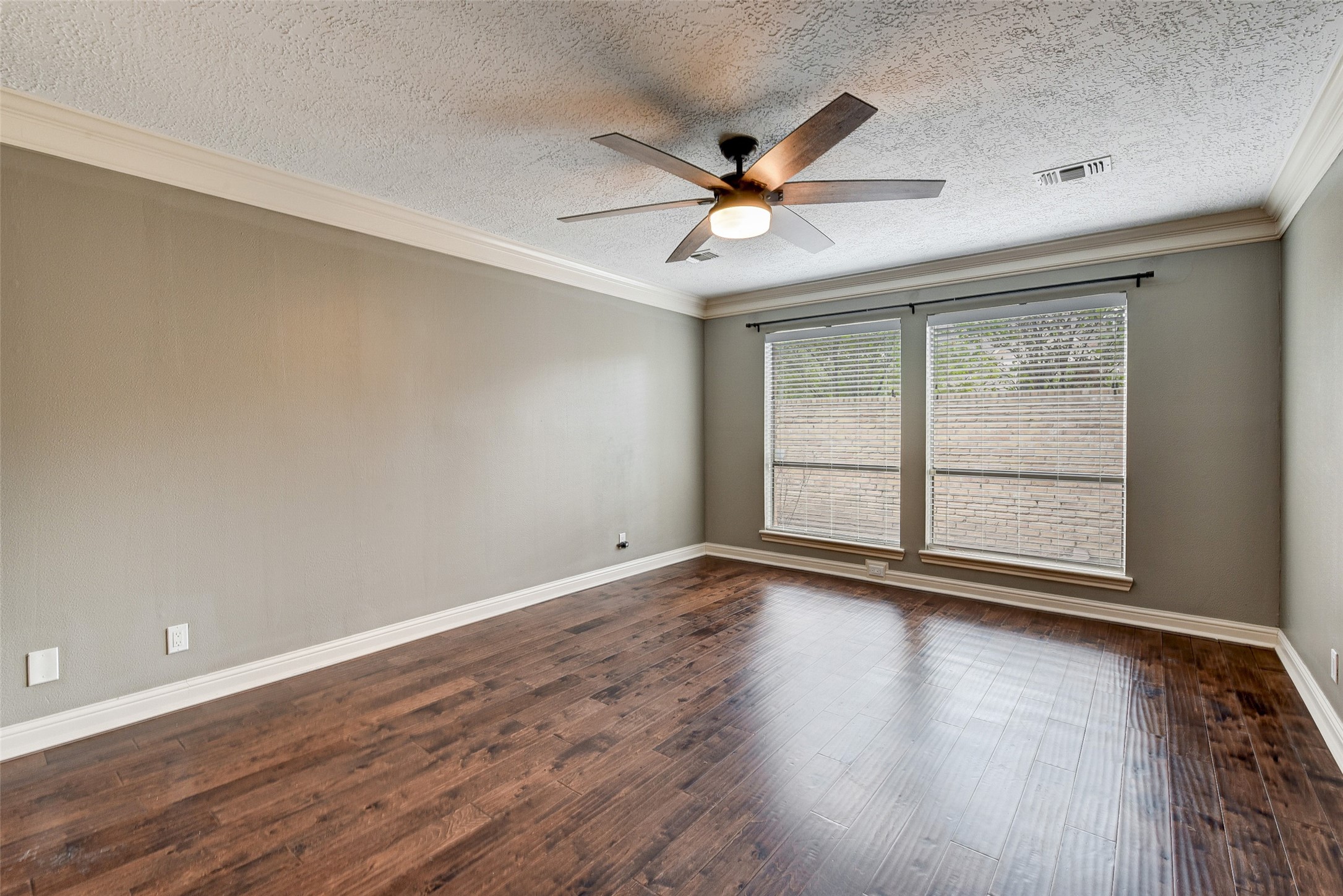18310 Lake Oaks Drive Spring, TX 77388 - Photo 26 of 31 a view of an empty room with wooden floor and a window